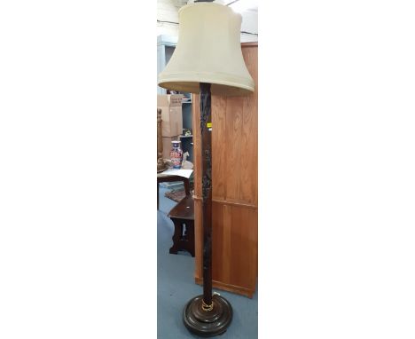 A Chinese carved hardwood standard lamp with pale green shade. Location:A3B 