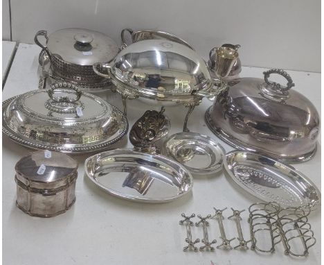 Silver plated items to include a revolving lid breakfast dish with serving ladle, a meat cloche, a table top box, toast rack,