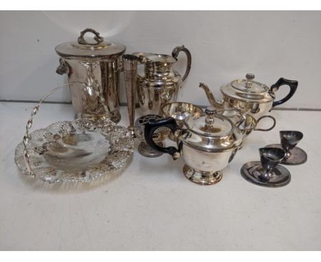 Mixed silver plated items to include an ice bucket, 2 teapots, jug, a pair of candlestick holders, and others Location:If the