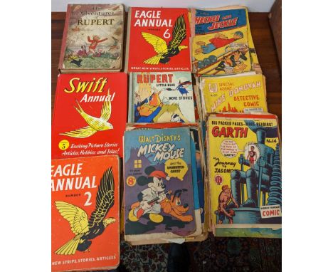 A collection of annuals and magazines to include Eagle annuals '2' and '6', Mickey Mouse and the Uninvited Guest circa 1951, 