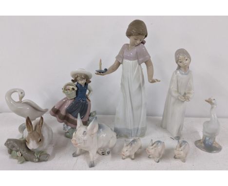 A collection of Lladro and Nao ornaments together with a Beswick pig and othersLocation:If there is no condition report shown