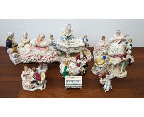 A collection of mainly Dresden figures and groups to include dancers, figures playing musical instruments and othersLocation: