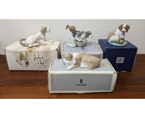 Dog related Lladro porcelain figures to include 'Unlikely Friends', Nao by Lladro 'Dog Lying Down', 'It Wasn't Me' and 'Bashf