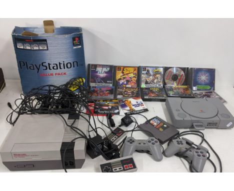 A Playstation 1 console and Nintendo console with games and controllersLocation:If there is no condition report shown, please