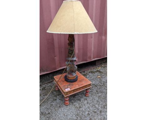 Antique Indian artefacts to include a painted wooden lamp fashioned as a figure and animal and a stool Location: Con BlueIf t