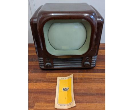 A Bush TV 22 Bakelite vintage television in original condition with tv magnifier and handbookLocationIf there is no condition