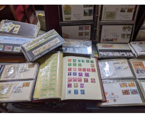 A quantity of First Day covers circa 1960s-2000s, album of First Day coin covers containing four silver proof coins, stamp al