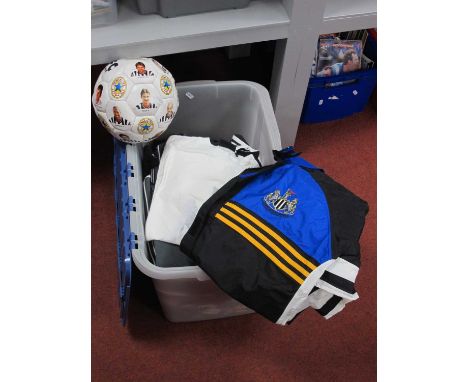 Newcastle United, sweatshirts, shorts, tracksuits, hats and other clothing, flags, ball, etc:- One Box.