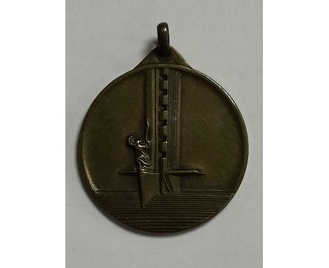 1930 World Cup Commemorative Medal in Bronze, the front featuring Tower of Homage at The Centenary Stadium, Montevideo, the r