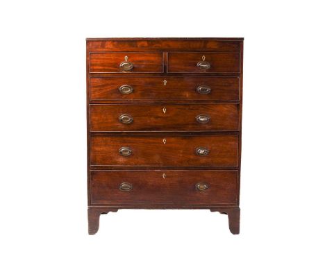 A large George III mahogany chest of two short over four long drawers with simple ebony and satinwood strung line inlay, supp