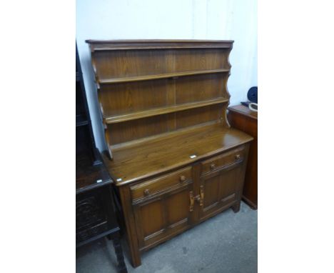 An Ercol Golden Dawn elm dresser 