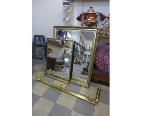 A brass fender, a gilt frame mirror and one other 