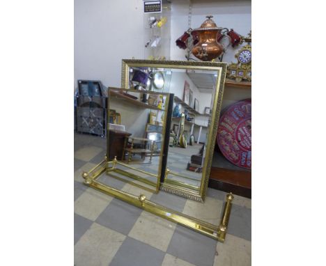 A brass fender, a gilt frame mirror and one other 