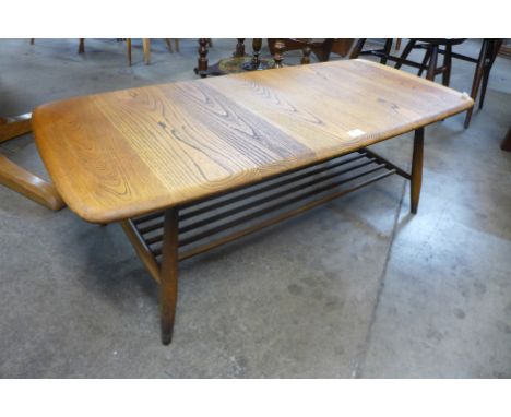 An Ercol Golden Dawn elm and beech Windsor coffee table 