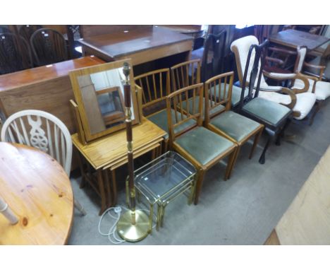 A teak effect toilet mirror, an ash effect nest of tables, a gilt metal and glass topped nest of tables and a standard lamp 