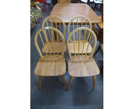 A set of four Ercol Blonde elm and beech Windsor chairs 