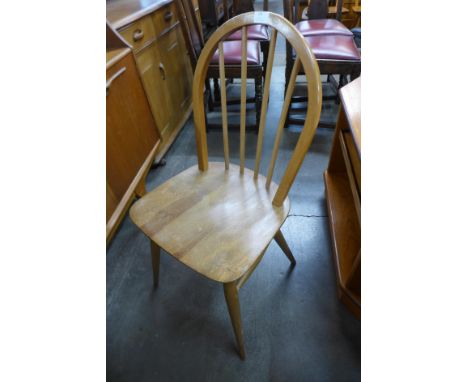 An Ercol Blonde elm and beech Windsor chair 