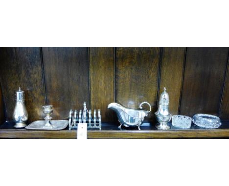 Epns wares to include sauceboat, toast rack, two sugar castor, candlestick and two glass salts, (7) 