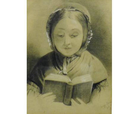 19th century School  Pencil and chalk head and shoulders portrait of a girl reading a book, signed and dated indistinctly, in