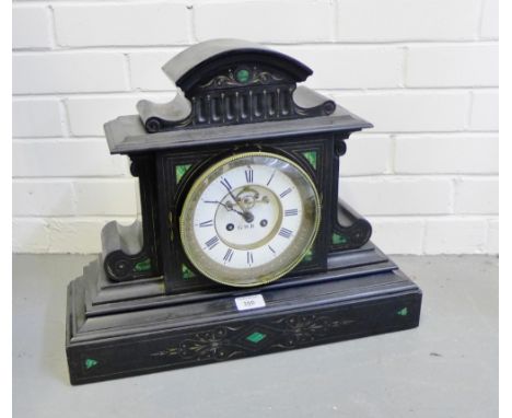 A black slate and malachite inlaid mantle clock of architectural form, the enamel dial inscribed GWR, possibly for Great West