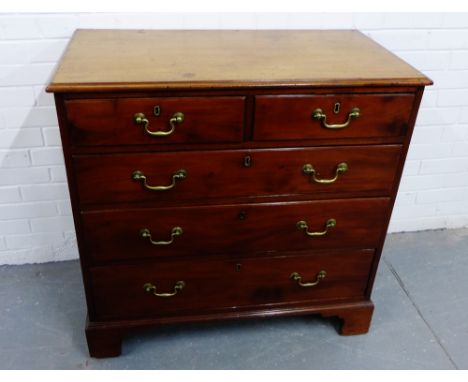 A mahogany chest, the rectangular top with moulded edge, over two short and three long drawers, on bracket supports, 94 x 94c