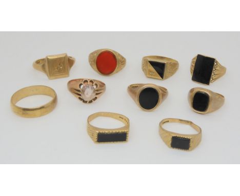 Eight assorted signet rings set with onyx etc, a wedding band and another ring, 40.1gms Condition Report:Available upon reque