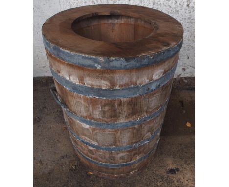 A 20th century coopered bin with detachable ring lid, 69cm high x 51cm diameter Condition Report:Available upon request