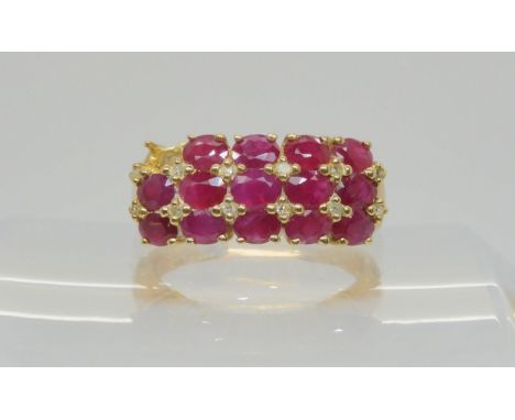 A 9ct gold ruby and diamond accent ring (one ruby missing) size P1/2, weight 4.9gms Condition Report:Available upon request