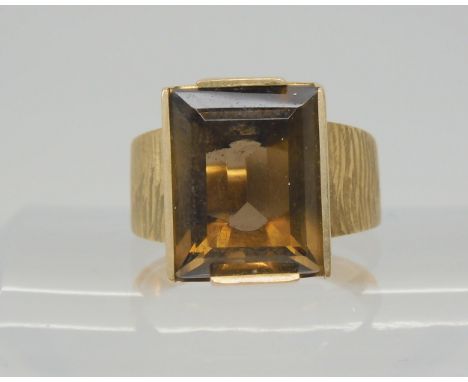 A 9ct gold retro smoky quartz ring, size S, weight 6.4gms Condition Report:Available upon request