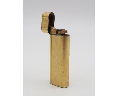 A Cartier Plaque d'Or gold-plated cigarette lighter Condition Report:Available upon request