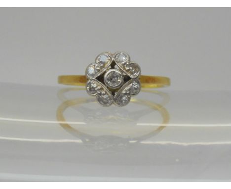 An 18ct gold and platinum vintage diamond ring, set with estimated approx 0.20cts, size L, weight 1.6gms Condition Report:Ava