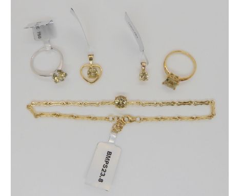A collection of Csarite jewellery including an 18ct white gold ring, a 9ct bracelet, both with tags, a 9ct gold square stone 