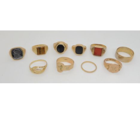 Ten assorted 9ct gold rings including tigers eye signet ring, carnelian example, wedding band etc, weight together 38.8gms Co