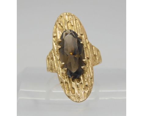 A 9ct gold retro smoky quartz ring, size O1/2, weight 6.6gms Condition Report:Available upon request