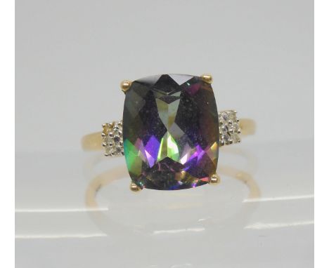 A 9ct gold mystic topaz and diamond accent ring,&nbsp; size P1/2, weight 3.1gms Condition Report:Available upon request