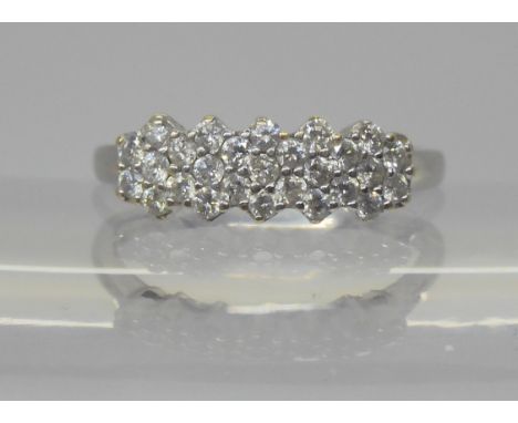 A 9ct white gold diamond cluster ring, set with estimated approx 0.50cts of brilliant cut diamonds, size N, weight 2gms Condi