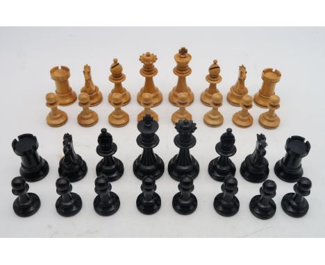 A boxwood chess set, in the manner of Staunton, the King measuring approx. 8.5cm in height, contained in a stained pine box C