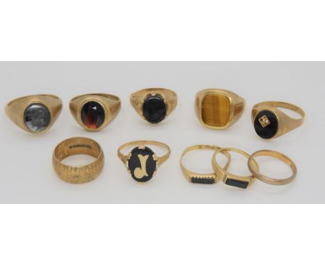 Ten 9ct gold rings to include, a Centurion signet ring size W1/2, a garnet signet ring approx size R, ect, weight together 37