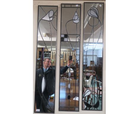 A lot of two 20th century ACD glass art leaded glass Rennie Mackintosh style wall mirrors, 123cm high x 23cm wide and a simil
