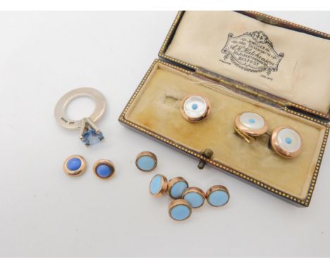 A collection of vintage buttons and a silver designer made ring set with a blue gem Condition Report:Not available for this l