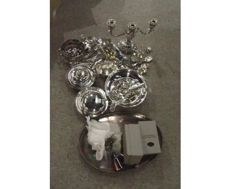 A collection of EPNS including cased goblets by Francis Howard Ltd, loose cutlery, sauce boats, a three light candelabrum, tr