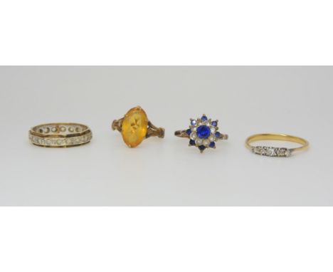 A bright yellow metal five stone diamond ring (two of the stones replaced with white gems) size R, weight 1.9gms, a 9ct gold 