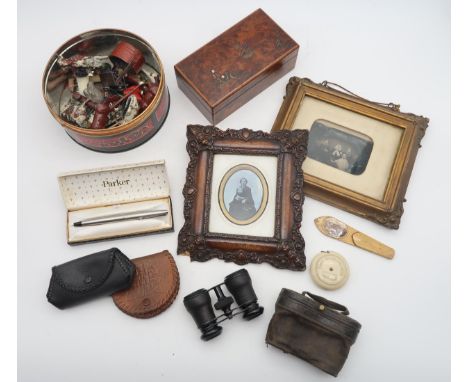 A mixed lot, to include an amboyna-veneered cigarette box, framed early portrait photography, a Mauchline ware page turner/le