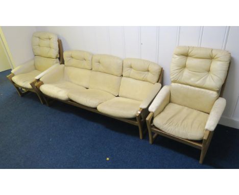 A mid 20th century Folke Ohlsson for Gimson and Slater teak framed three piece suite consisting, three seater sofa, 75cm high