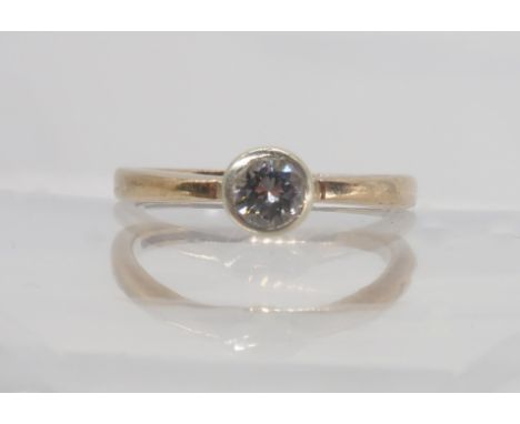 A 9ct gold diamond solitaire ring set with an estimated approx 0.25cts brilliant cut diamond, finger size M1/2, weight 2.1gms