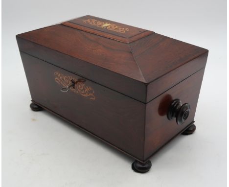 A Victorian marquetry and mother-of-pearl-inlaid sarcophagus-form rosewood tea caddy Condition Report:Available upon request