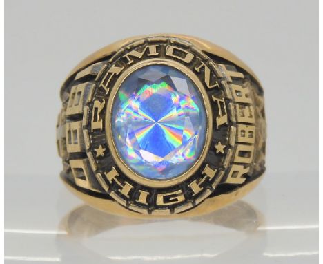 A 10k gold College ring for Ramona High 1990, set with a glass gem, size V1/2, weight 16.2gms Condition Report:Available upon