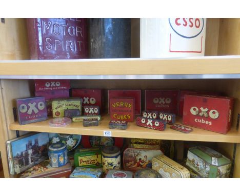 A shelf full of mostly OXO tins etc.