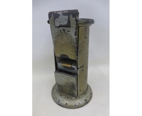 A British Railways ticket punching machine.