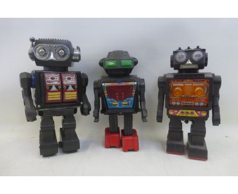 A Japanese part tinplate Mr Galaxy robot and two fighter robots. 